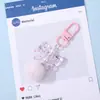 Chaveiro Pingente Bola de Pelúcia com Laço Colorido Estilo Ins Miçangas para Montagem DIY Acessório Versátil para Decoração de Bolsa de Trabalho