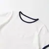 Camiseta de Manga Corta con Cuello Redondo y Bloques de Color Elegante Estilo Europeo y Americano Transfronterizo 2026 Nueva Moda para Mujer Venta al por Mayor 0085301