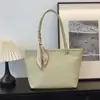 Bolso tote elegante de color liso y gran capacidad, nuevo diseño de nicho 2026 para el trabajo, los desplazamientos y el uso casual, bolso de hombro de moda
