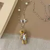 Collar con colgante de oso de dibujos animados aterciopelado dulce y genial, cadena de metal de diseño único, collar para suéter 2026, gargantilla linda