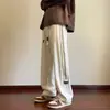Pantalones casuales de otoño para hombre, recién llegados, estilo Hong Kong, modernos, holgados, de talla grande, con pierna recta, pantalones anchos a rayas a la moda para estudiantes.