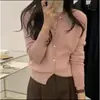 Cárdigan de punto grueso con cuello redondo para mujer, nueva colección otoño/invierno 2026, estilo coreano, suéter simple y estilizado, prenda exterior versátil, moderno
