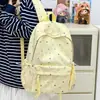Nueva mochila de dibujos animados de estrellas linda transfronteriza para estudiantes de secundaria femeninas, alto valor estético, simple, ligera, de gran capacidad, con doble hombro
