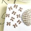Sonido de Agitación Otoño e Invierno Maillard Nuevo Lazo Leopardo Resina Joyería para Uñas Accesorios para Uñas Venta al por Mayor
