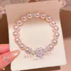 Pulsera Redonda de Perlas y Circonita de Lujo Ligero Francés Nicho de Gama Alta Exquisita Pulsera Retro Versátil para Mujer
