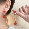 Pendientes festivos de Año Nuevo rojos, pendientes de año de nacimiento de dragón femenino, pendientes de diseño de nicho de alto sentido, pendientes de Año Nuevo de otoño e invierno