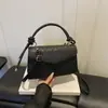 2026 Nueva Bolsa de Mujer de Alto Valor Textura Simple Nicho Bolso de Axila Casual al Aire Libre de Moda Bolso Cruzado para Mujer