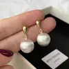 Brincos Minimalistas de Bola Prateada Escovada para Mulheres 2025 Novo Estilo Quente Brincos de Alta Qualidade Brincos Modernos e Versáteis
