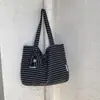 Elegante bolsa de lona a rayas estilo coreano para mujer, nueva colección 2026, gran capacidad, adecuada para salidas, ir al trabajo y ir de compras.