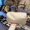 Bolso de mano de lunares versátil estilo ins, bolsa para maquillaje, bolsa de almacenamiento ligera y de gran capacidad, conveniente para viajar y fácil de llevar