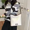 Bolso Grande Nuevo Retro Simple para Mujer 2026 Versátil para Viajes Diarios Moda Venta Caliente Casual Temperamento Hombro Único Cruzado