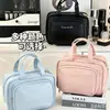 Nova bolsa de maquiagem azul claro 2026, grande capacidade, à prova d'água, com compartimentos e camadas, uma bolsa de armazenamento luxuosa e portátil
