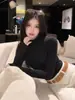 Camiseta Básica Versátil de Color Sólido para Mujer 2026 Otoño Nuevo Estilo Super Bonita Cuello Alto Manga Larga Top Base