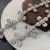 Cadena de diamantes de hierba de cuatro hojas, elegante cadena de diamantes de soldadura de moda, cadena de ropa, zapatos y sombreros, accesorios decorativos en stock al por mayor
