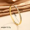Pulsera de titanio y acero de alta gama transfronteriza con diamantes pulsera de acero inoxidable oro real de 18k galvanizado en horno pulsera abierta para mujer