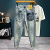 Venta al por mayor de moda para hombre Xintang Jeans ajustados pitillo retro bordados cónicos para primavera y otoño para hombre