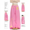 Comércio Transfronteiriço Estilo Preguiçoso Estampa Cruzada Calça Jogger Rosa para Mulheres Calças Casuais Retas Largas Calças Esportivas Estilo Americano