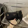 Bolsas para Mulheres 2025 Novo Estilo Bolsa de Ombro Tendência da Moda Axila Textura Elegante Nicho Trabalho Bolsa Meia-Lua para Mulheres