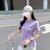 Foto Real # Camiseta Preta de Manga Curta para Mulheres Primavera 2026 Casual Afina a Cintura Emagrecimento Solta Design Assimétrico Único Bonito