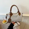 Bolsa feminina de grande capacidade 2026 nova moda bolsa tote texturizada bolsa de ombro popular bolsa de mão patchwork casual