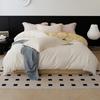 Juego de cama de cuatro piezas de algodón cepillado grueso de 100 piezas, juego de cama de cuatro piezas de algodón de fibra larga de alta gama para otoño e invierno