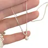 Collar de plata con perla en forma de gota estilo francés para mujer, nuevo modelo 2026, cadena de clavícula de nicho de alta gama, accesorio de moda y versátil