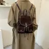 Mochila casual de cordón de estilo coreano de nicho para mujer, nueva colección de otoño, diseño multibolsillos, chic y versátil para ir al trabajo, con un ambiente preppy universitario