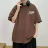 Camiseta de manga corta para hombre 2026 nuevo verano algodón estilo americano manga corta moderna holgada blanca versátil ropa con manga tres cuartos