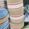 Tela de papel personalizada, varios colores de tela de papel para manualidades, tela de ganchillo y materiales de embalaje para productos de manualidades se pueden personalizar según sus diseños.