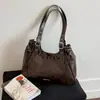 Bolso de hombro de moda estilo vintage con diseño europeo y americano, bolso de hombro tachonado, bolso de mano único estilo motocicleta, bolso de axila