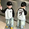 Camiseta de manga larga para niño de algodón puro con bloques de color, camiseta básica de primavera y otoño, nuevo top raglán elegante y versátil para niños mayores