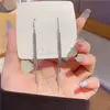 Nuevos pendientes de borlas de moda 2023 para mujer, pendientes elegantes y a la moda, pendientes largos de metal exquisitos, adelgazantes para mujer