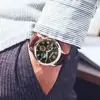 Modelo Básico Al Por Mayor En Stock Nicho Reloj para Hombre Transmisión en Vivo de Tiktok Tres Ojos Estrella y Luna Casual Reloj de Cuarzo para Hombre con Correa de Cuero