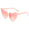 Moda novo amor óculos de sol femininos moda europeia e americana dobradiça dente coração de pêssego óculos de sol óculos personalizados fábrica atacado
