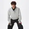 Suéter de punto de alta gama estilo americano con cuello polo para hombre, marca de tendencia Otoño e Invierno, top de punto versátil casual suelto simple para pareja