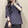 Nueva camisa de manga corta estilo chino con tapeta diagonal y cierre de botones, colección de verano 2026 para mujer, de alta gama, con una estética china tradicional y un diseño inspirado en el Zen, hecha de algodón y lino
