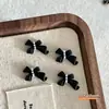 Accesorios Clásicos para Uñas Negras Tendencia Moño Estrella Explosión Moño Flotante Corbata de Moño Decoraciones para Uñas Accesorios