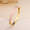 Pulsera de titanio y acero de alta gama transfronteriza con diamantes pulsera de acero inoxidable oro real de 18k galvanizado en horno pulsera abierta para mujer