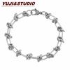Pulseira de Corrente Cruzada Nova de Nicho com Nós Corrente de Espinho Estilo Frio para Homens e Mulheres Tendência Legal Hip-Hop Aço Titânio Geometria de Casal