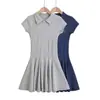 Vestido de temperamento con solapa polo estilo universitario para mujer 2024 verano nuevo diseño de pedrería abotonado cintura alta falda corta