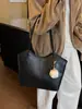 Bolso de mujer de gran capacidad, moderno y de alta gama, transfronterizo, nuevo modelo 2026, bolso de hombro casual de moda, bolso tote versátil de nicho