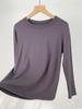Camiseta de manga larga de algodón súper suave y cómoda para mujer, nueva camiseta de primavera con cuello redondo en color liso y base interior.