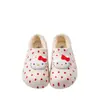 Zapatillas de algodón auténticas Sanrio Hello Kitty otoño e invierno 2026 nuevas para interior de dibujos animados lindas impermeables