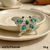 Broche de mariposa hueco con diamantes de moda europea y americana, accesorios de ropa para mujer, aleación galvanizada, accesorios de joyería antideslizamiento, ramillete