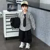 Conjunto de Ropa de Otoño para Niños Estilo Coreano 2026 Nuevo Conjunto de Tres Piezas de Camisa y Chaleco para Niños de Cinco Años Ropa de Otoño para Bebés Niños