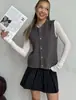 Nuevo Estilo Transfronterizo Simple de Un Solo Botón Cuello Redondo Adelgazante Apilado Chaleco de Punto para Mujer Suelto sin Mangas Color Sólido