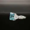 Anillo de Diamante de Alto Carbono S925 Europeo y Americano Explosiones en Vivo Femeninas Cara de Corte Flor de Hielo Seiko Anillo de Diamante Incrustado Completamente Uso Diario