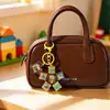Chaveiro Rotativo de Teclado Autêntico Toy Story da Disney Botão Anti-Estresse Pingente de Bolsa Pequeno Presente Atacado