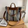 Bolso de gran capacidad para mujer, nuevo bolso de lona a rayas para el verano de 2026, bolso de hombro tipo tote casual, bolso de mano para viaje