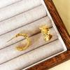 Pendientes geométricos en forma de C de estilo de costura de personalidad de tendencia europea y americana, temperamento frío simple de alto nivel, pendientes chapados en oro